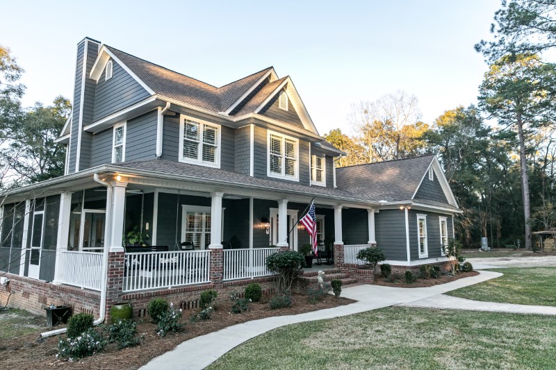 Front,View,Of,A,Large,Two,Story,Blue,Gray,House